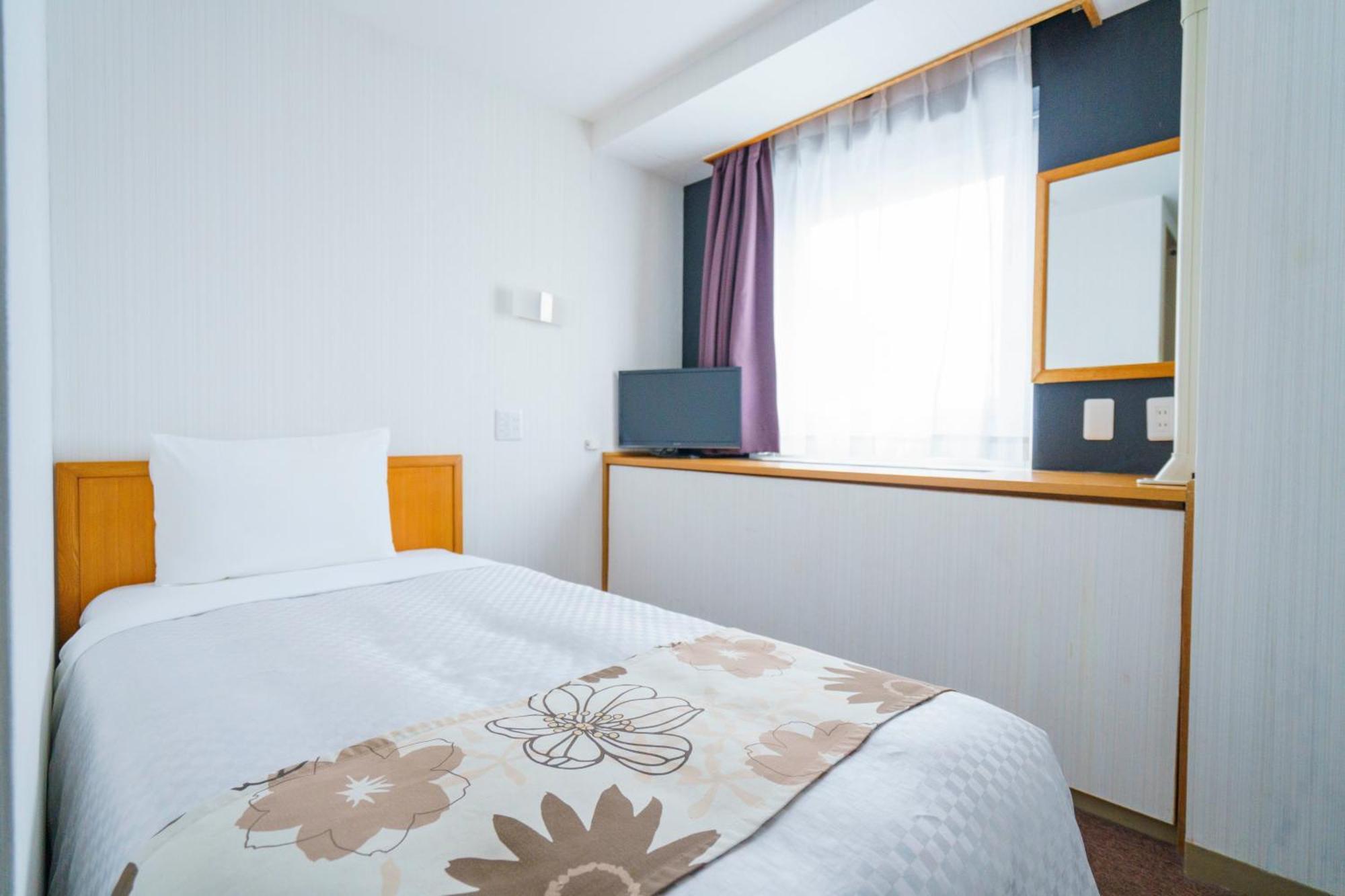 Hotel Ocean Naha Quarto foto