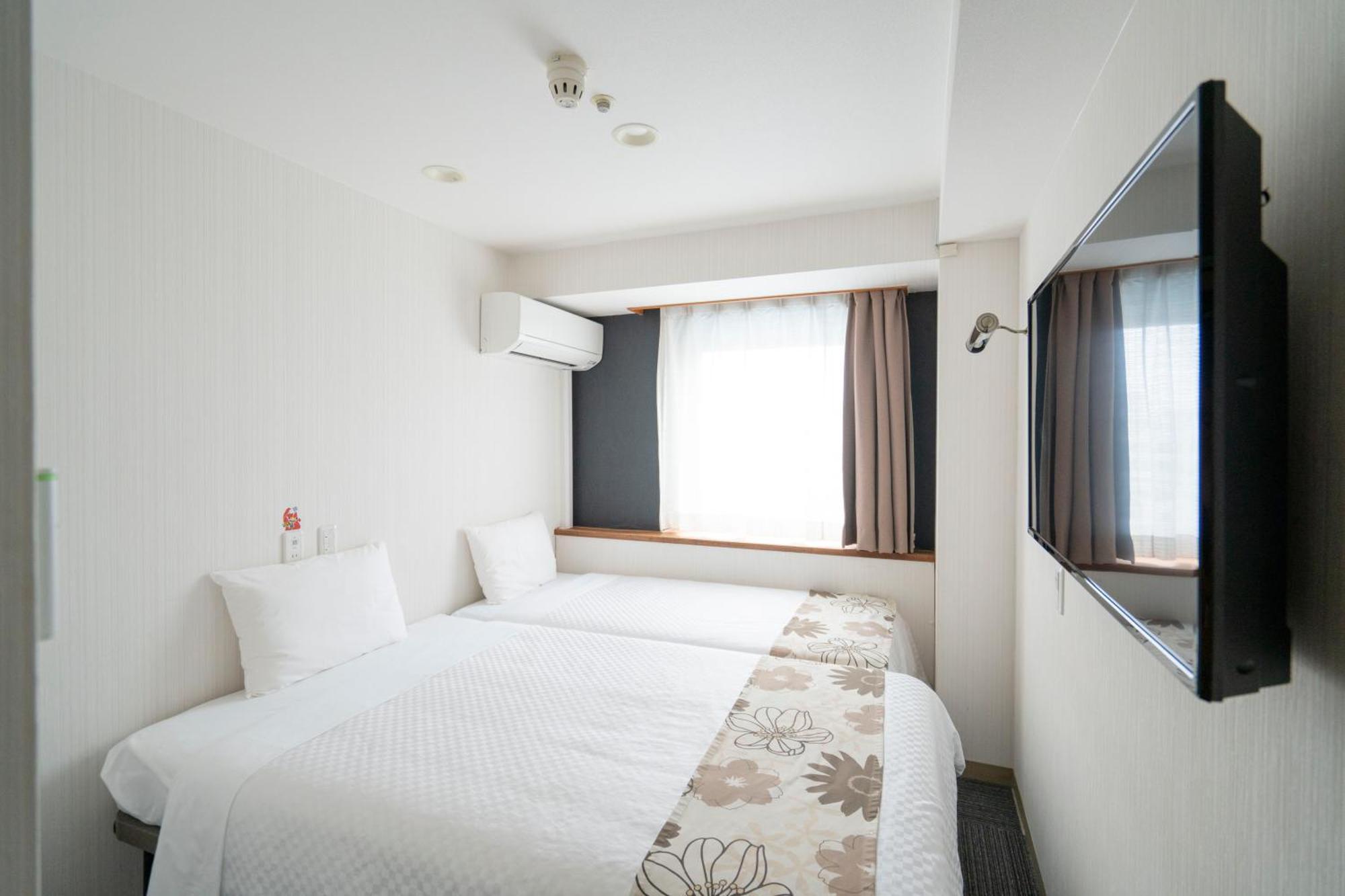 Hotel Ocean Naha Quarto foto